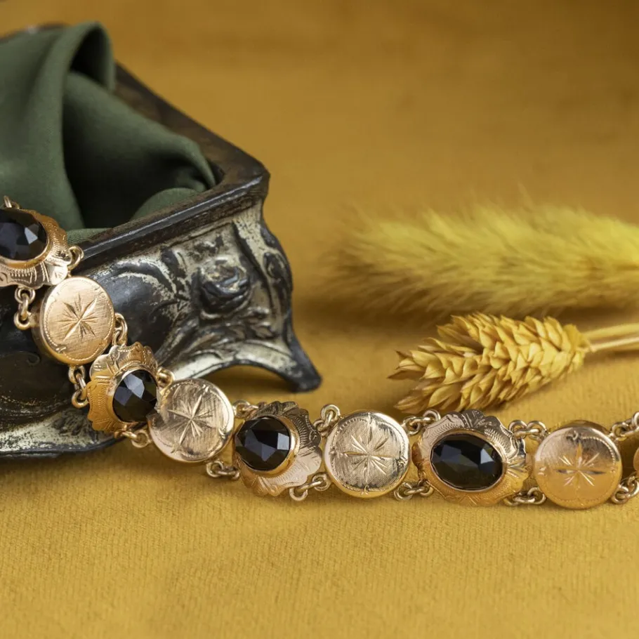 Gold boats bracelet with garnet 14 krt>Vintage Jewellery Outlet