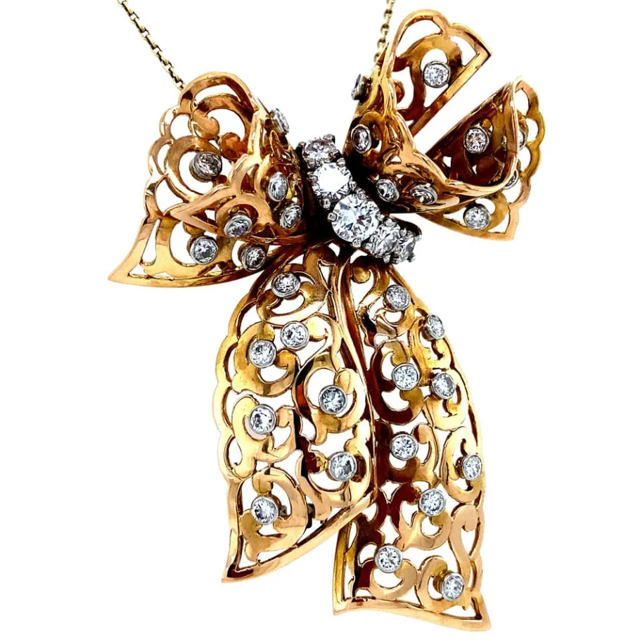 gold_bow_pendant_with_dia_2.webp Gold bow pendant with diamonds 14 krt/950>Vintage Jewellery Online