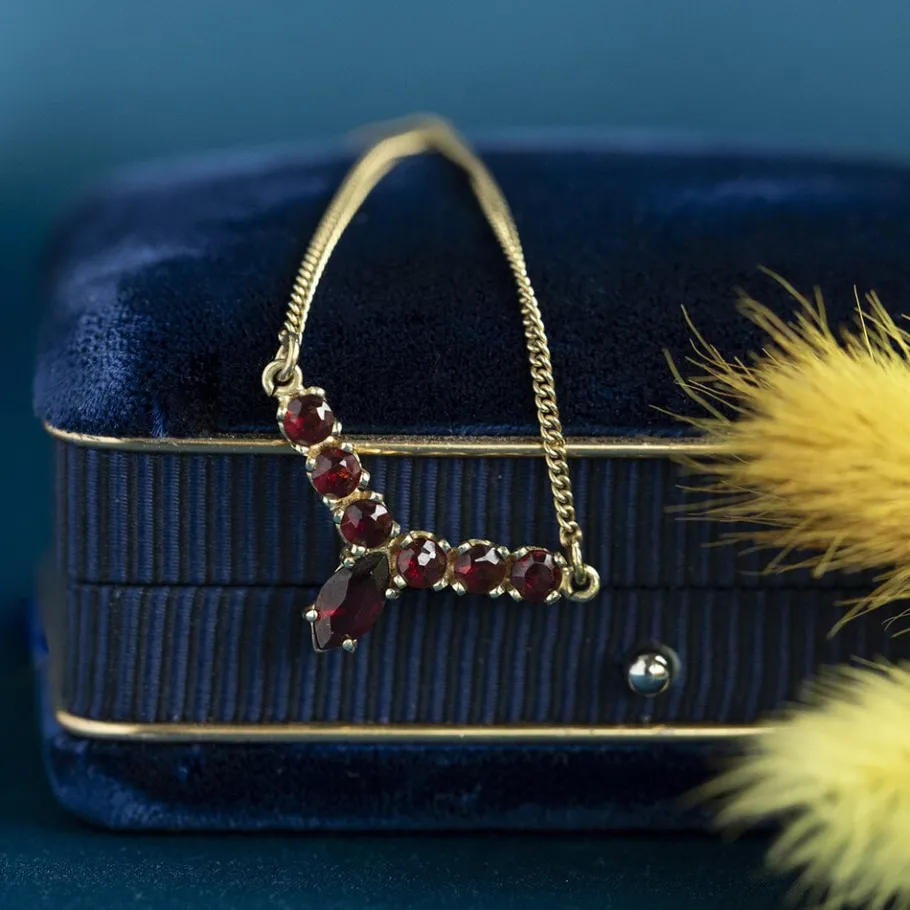 Gold curb necklace with garnet pendant 14 krt>Vintage Jewellery Online