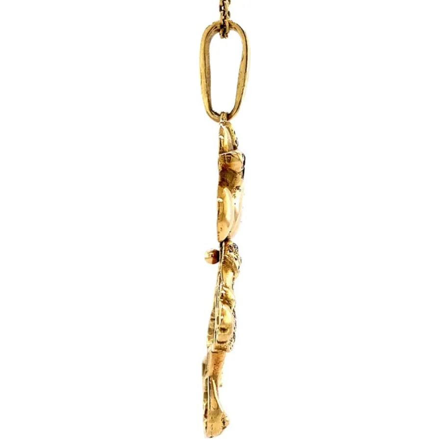 gold_minnie_mouse_pendant_3.webp Gold Minnie Mouse pendant with ruby, sapphire and diamond 14 krt>Vintage Jewellery Outlet
