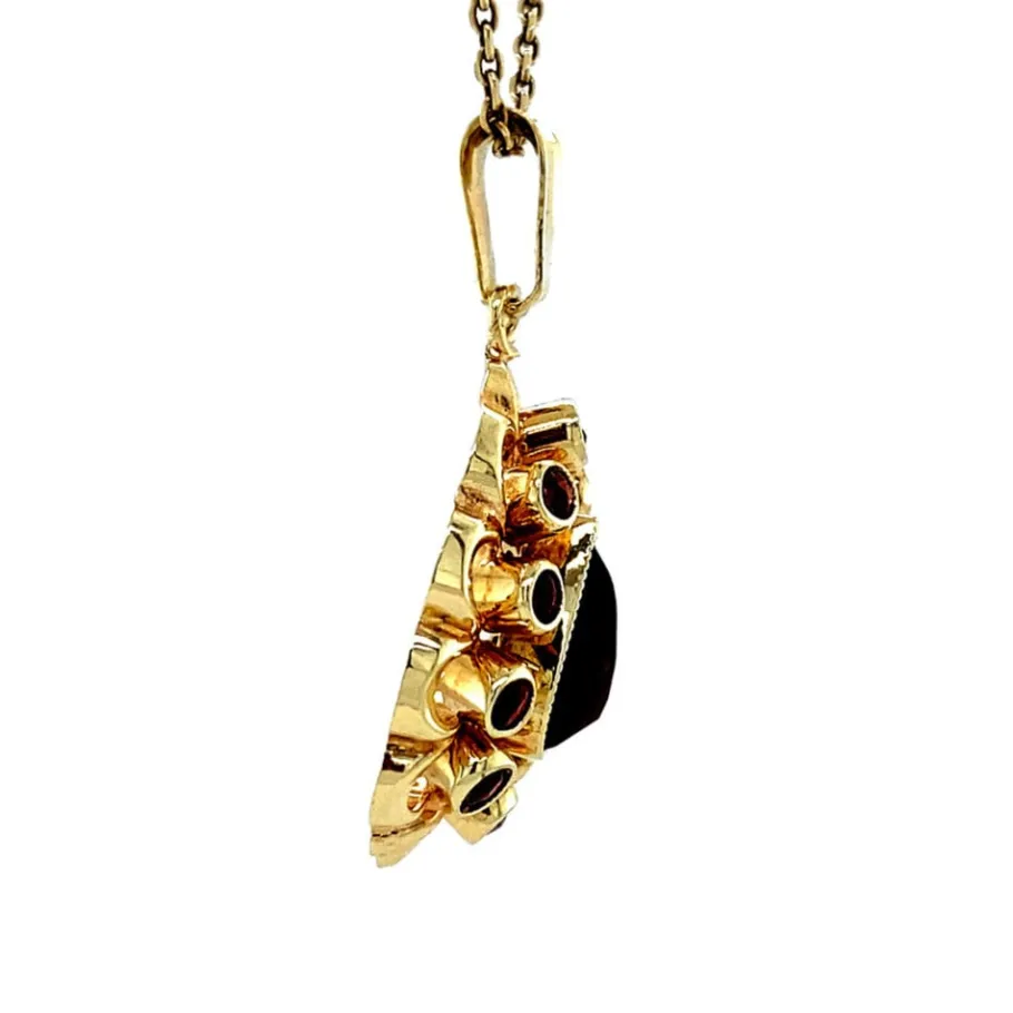 gold_pendant_with_garnet__3-8.webp Gold pendant with garnet 14 krt>Vintage Jewellery Outlet