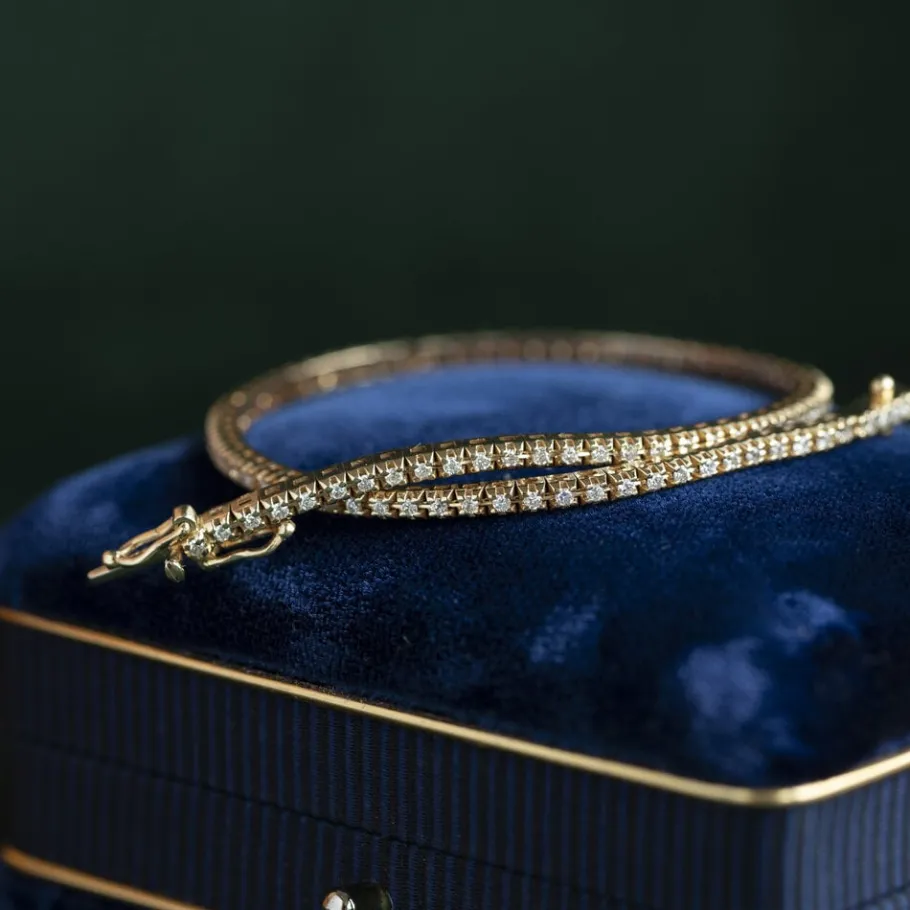 Gold tennis bracelet with diamonds 14 krt>Vintage Jewellery Outlet