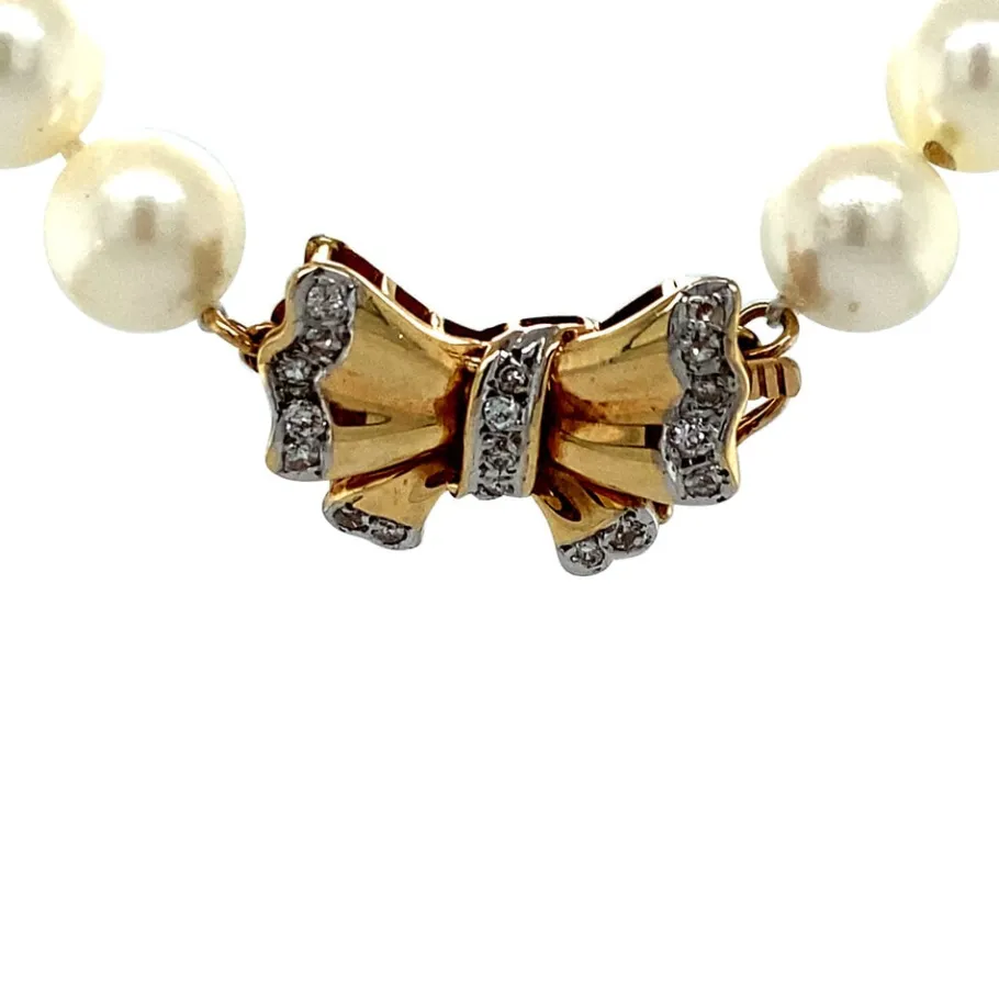 pearl_necklace_with_gold__4-16.webp Pearl necklace with gold bow clasp 14 krt>Vintage Jewellery Sale
